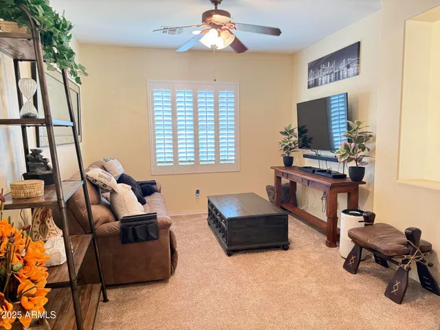 a bathroom with a double vanity sink toilet and shower