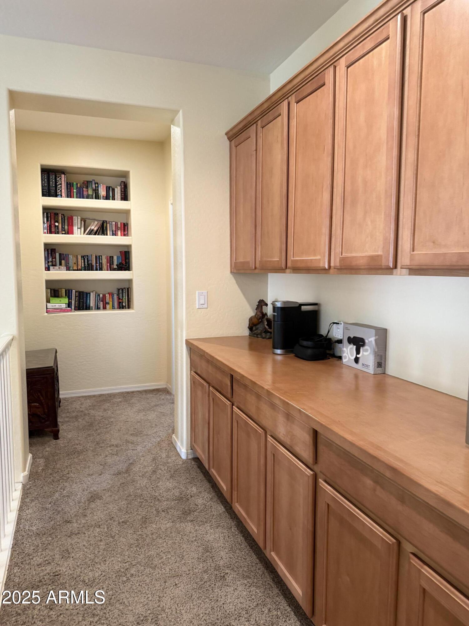 2245 West Clearview Trail Phoenix, AZ 85086 - Photo 38 of 76 a kitchen with stainless steel appliances white cabinets and a window