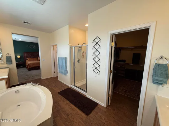 a view of a house with pool and chairs