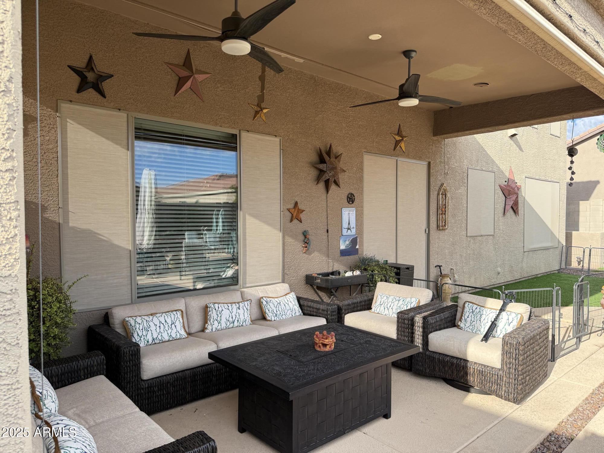 2245 West Clearview Trail Phoenix, AZ 85086 - Photo 58 of 76 a living room with furniture and a large window