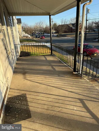 a view of a street from a balcony