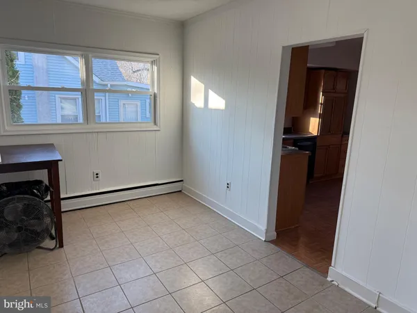 a view of a room with a fireplace