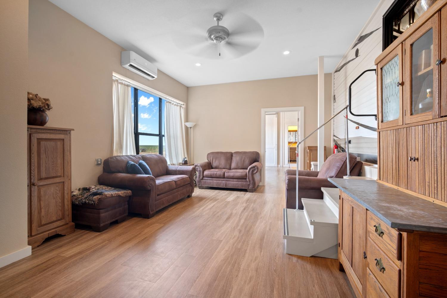 1384 County Road 211 Wilson, TX 79381 - Photo 18 of 44 a living room with furniture and a window