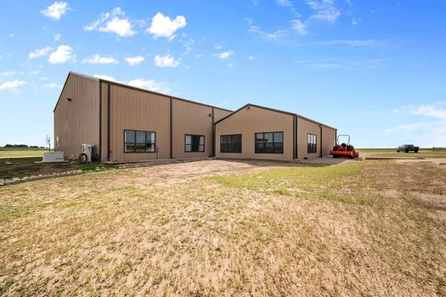 a front view of house with yard