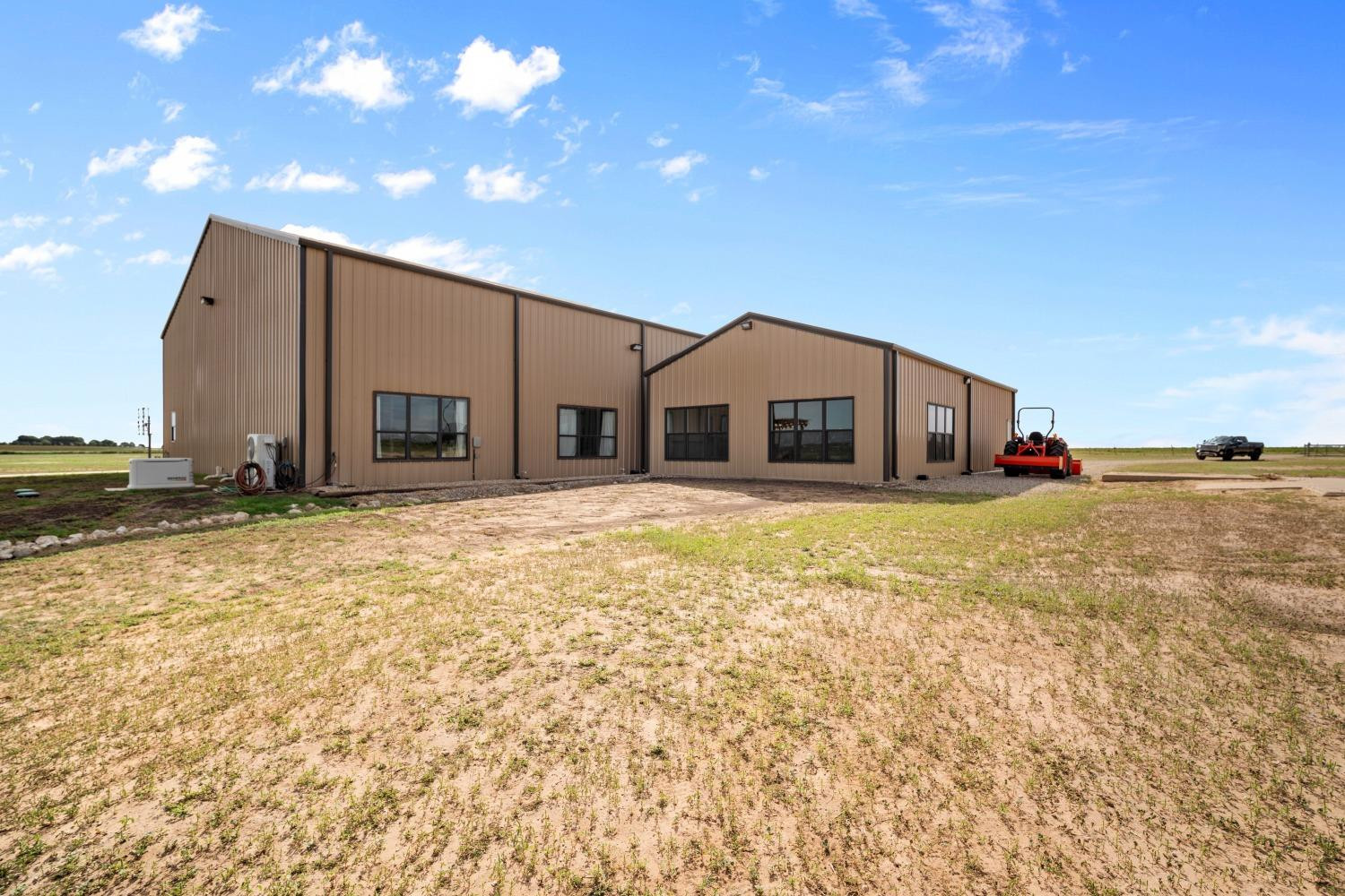 1384 County Road 211 Wilson, TX 79381 - Photo 4 of 44 a front view of house with yard