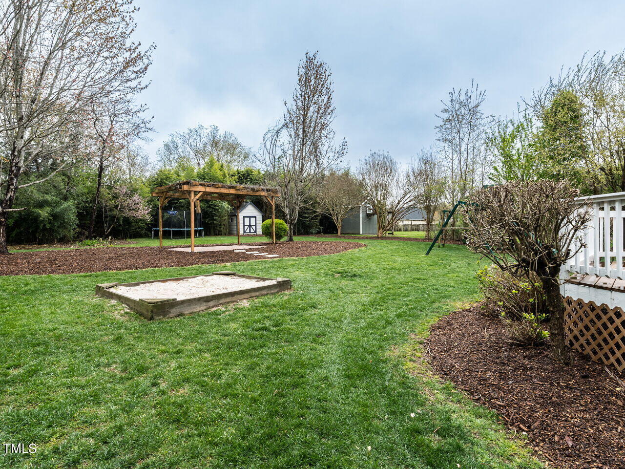 214 Competition Road Raleigh, NC 27603 - Photo 29 of 32 a view of a house with swimming pool and yard