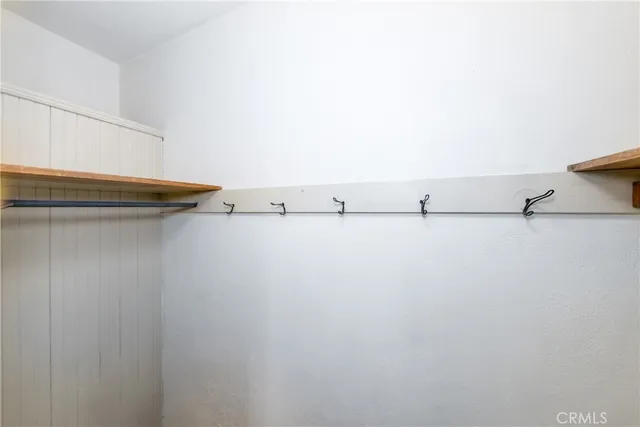 a view of a house with a yard and plants