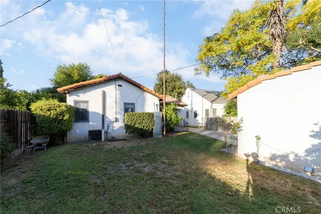 a view of a yard with an outdoor space
