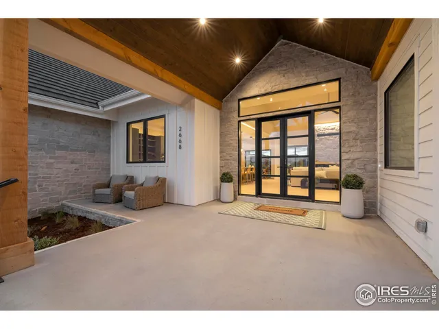 a view of an empty room with a fireplace
