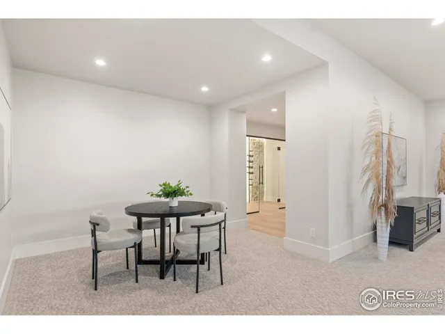 a workspace with furniture and a window