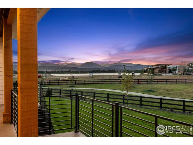 a view of lake with a city