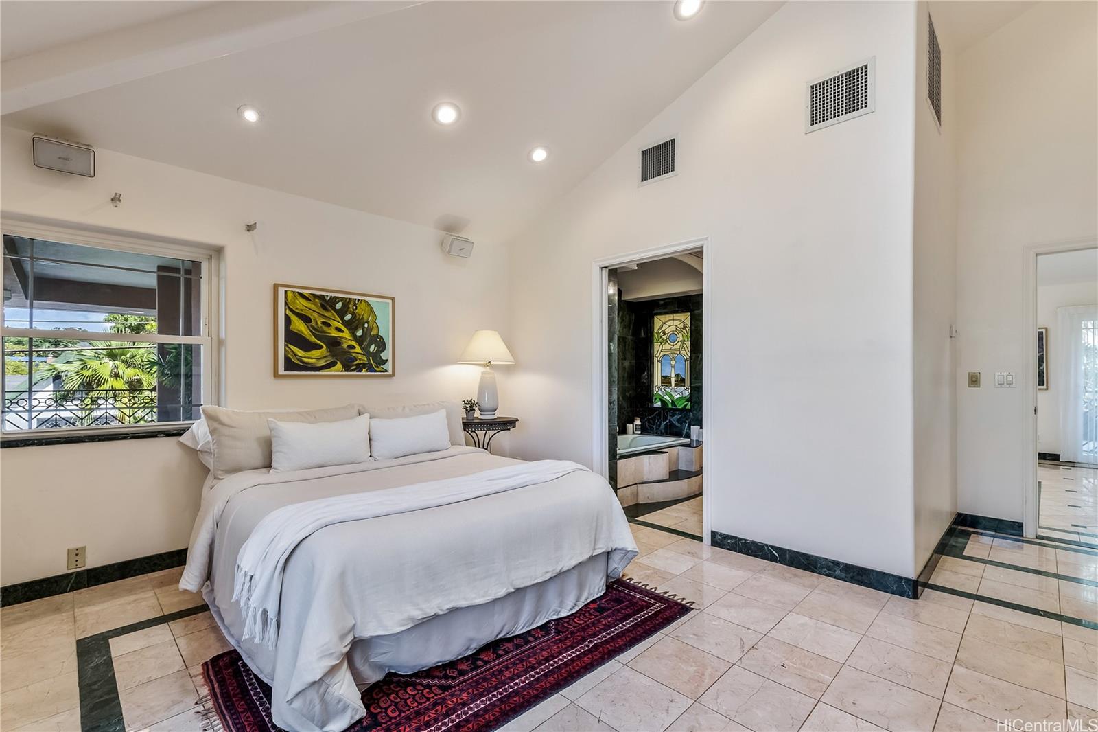 3063 Diamond Head Road Honolulu, HI 96815 - Photo 17 of 25 This large ensuite bedroom on the 2nd floor with high ceilings, a larger bathroom with tub and lots of natural light opens up to private lanai
