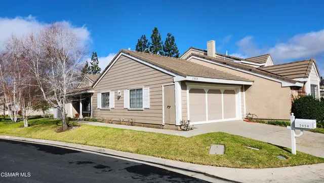 front view of house with a yard