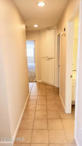 a view of a room with a hallway