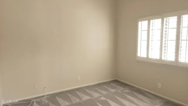 a view of an empty room with window