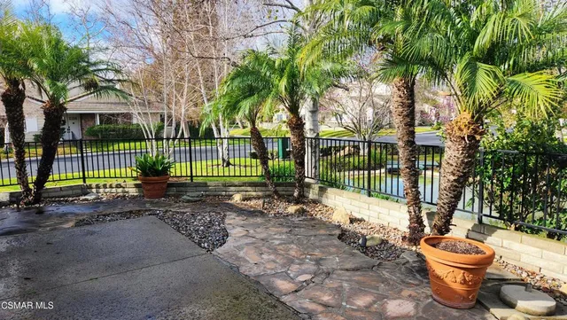 a front view of a house with glass windows
