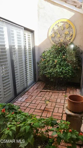 a view of a backyard of the house