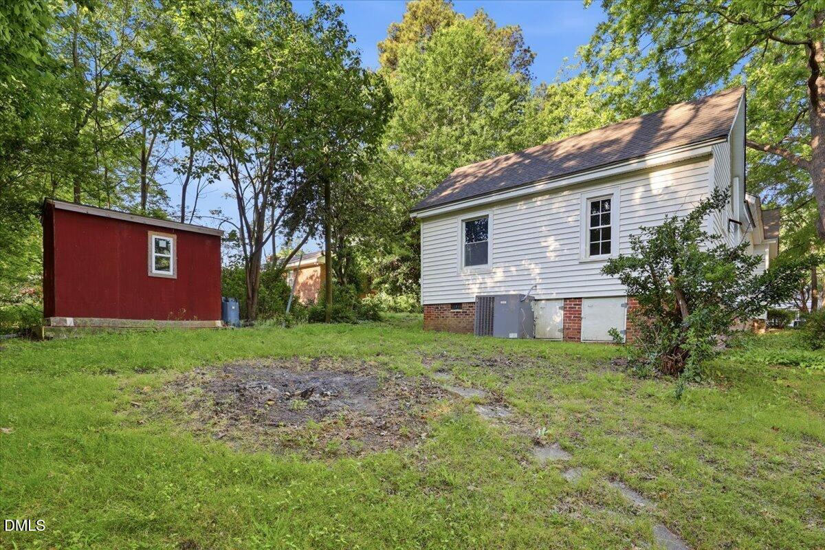 511 South Pine Street Spring Hope, NC 27882 - Photo 30 of 32 a house view with a backyard space