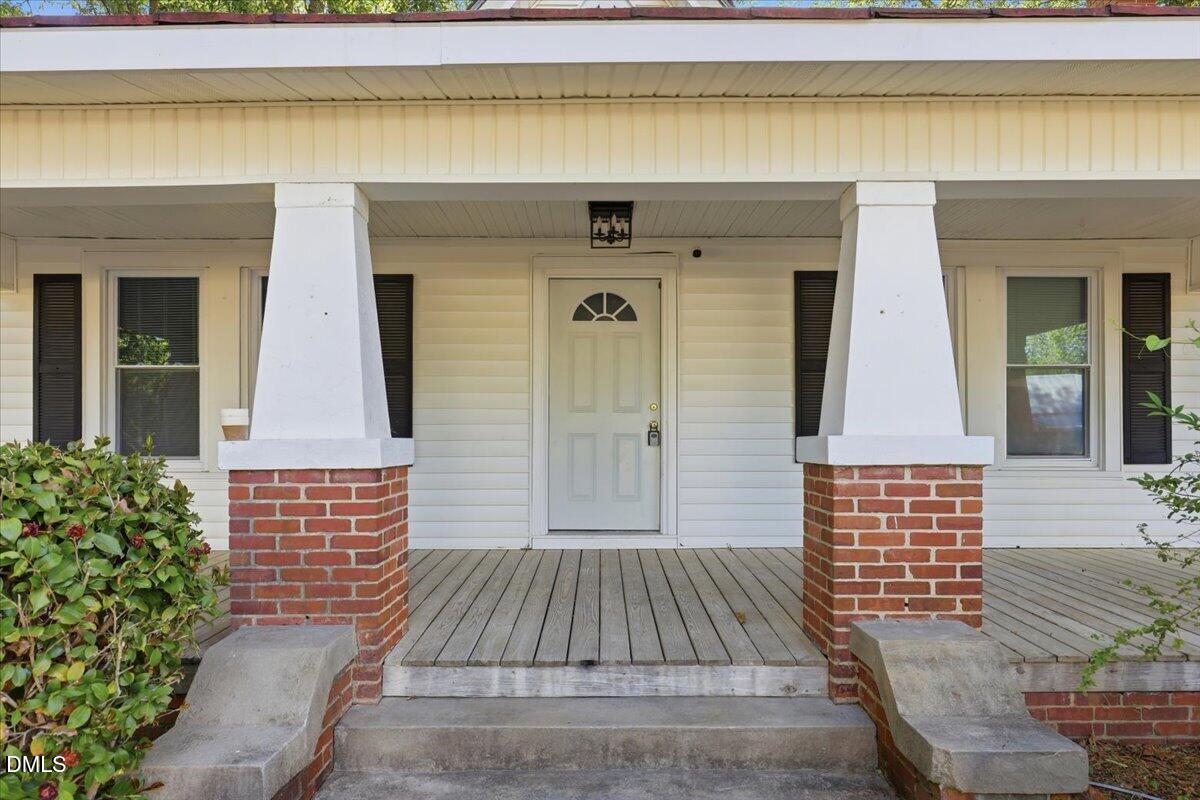 511 South Pine Street Spring Hope, NC 27882 - Photo 3 of 32 front view of a house with a door
