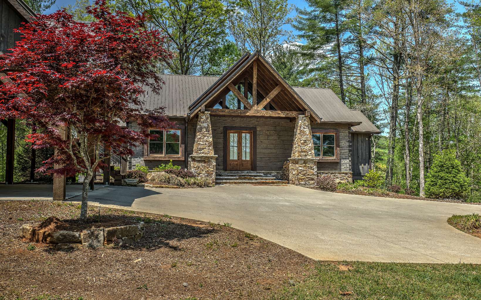 136 Devils Den Road Epworth, GA 30541 - Photo 1 of 4 a front view of a house with yard and trees