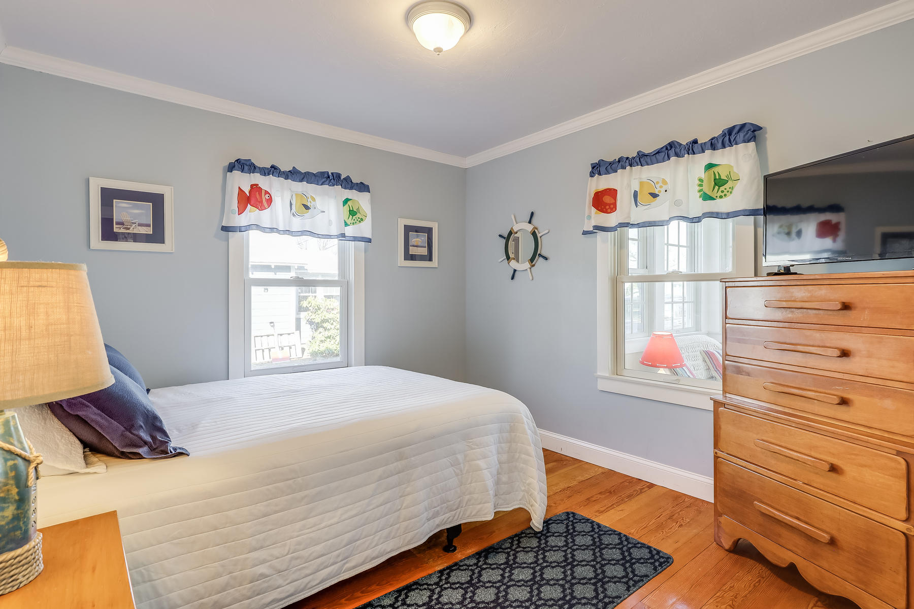 21 Carr Road Dennis Port, MA 02639 - Photo 14 of 33 a bedroom with a bed and a window