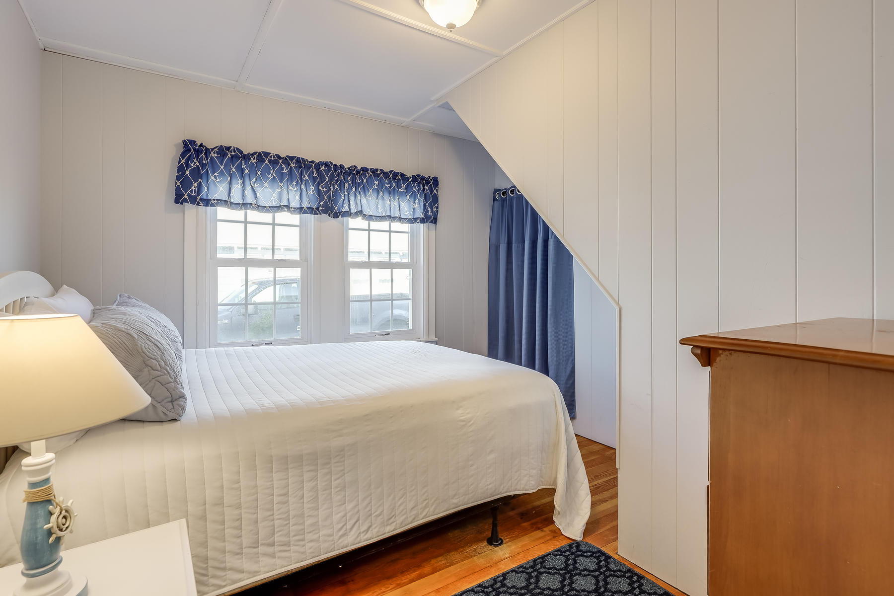 21 Carr Road Dennis Port, MA 02639 - Photo 15 of 33 a bedroom with a bed and window