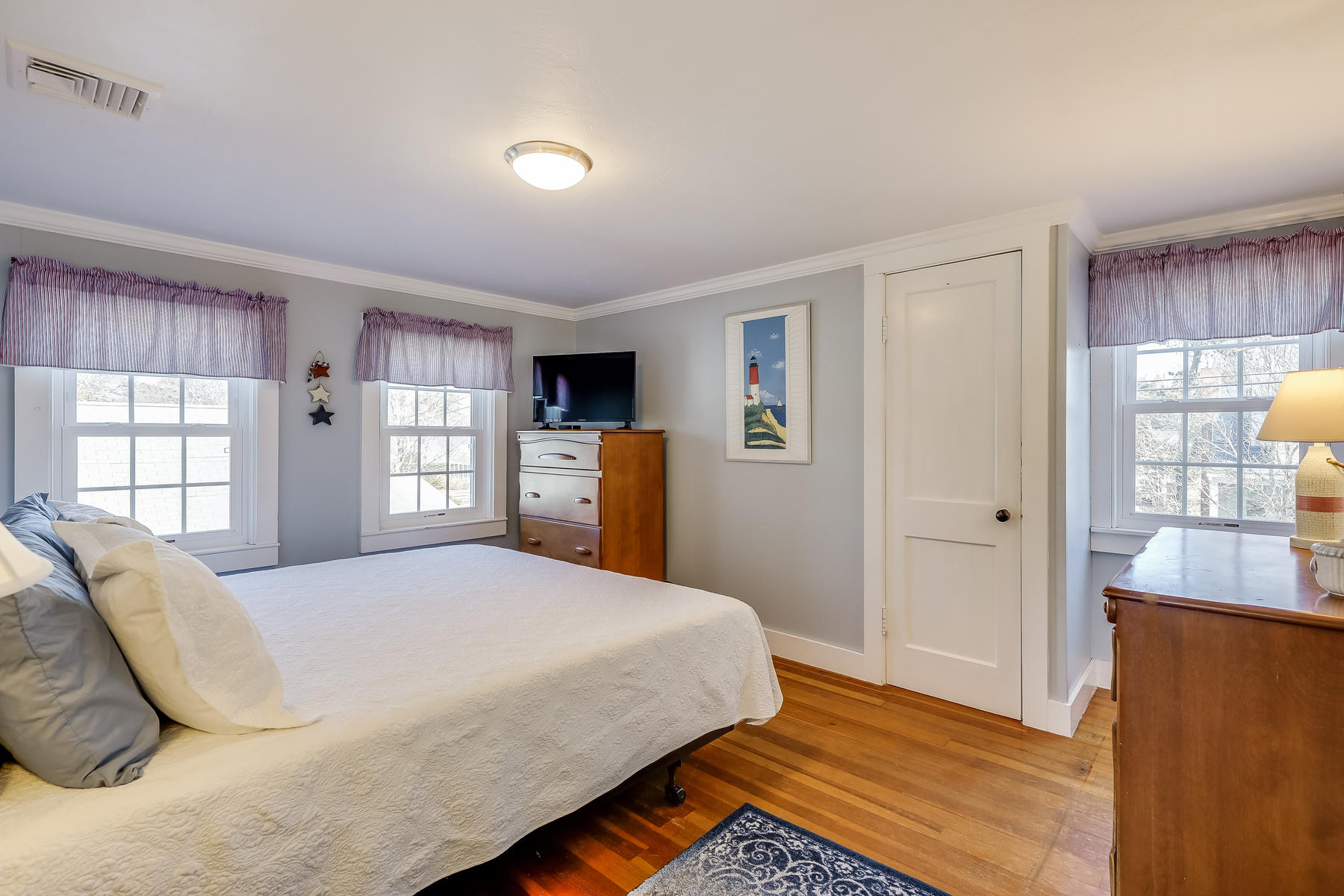 21 Carr Road Dennis Port, MA 02639 - Photo 18 of 33 a bedroom with a bed and window