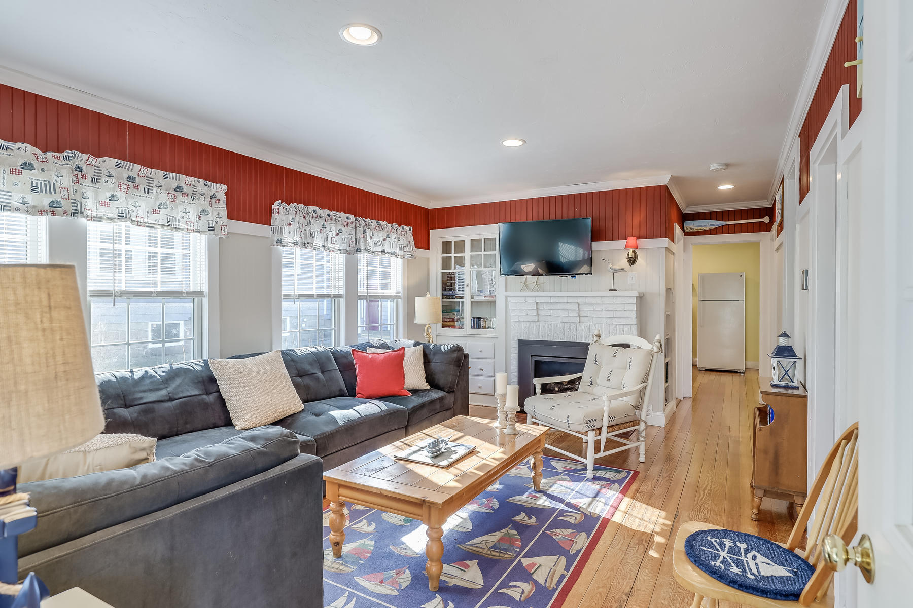 21 Carr Road Dennis Port, MA 02639 - Photo 4 of 33 a living room with furniture and a fireplace