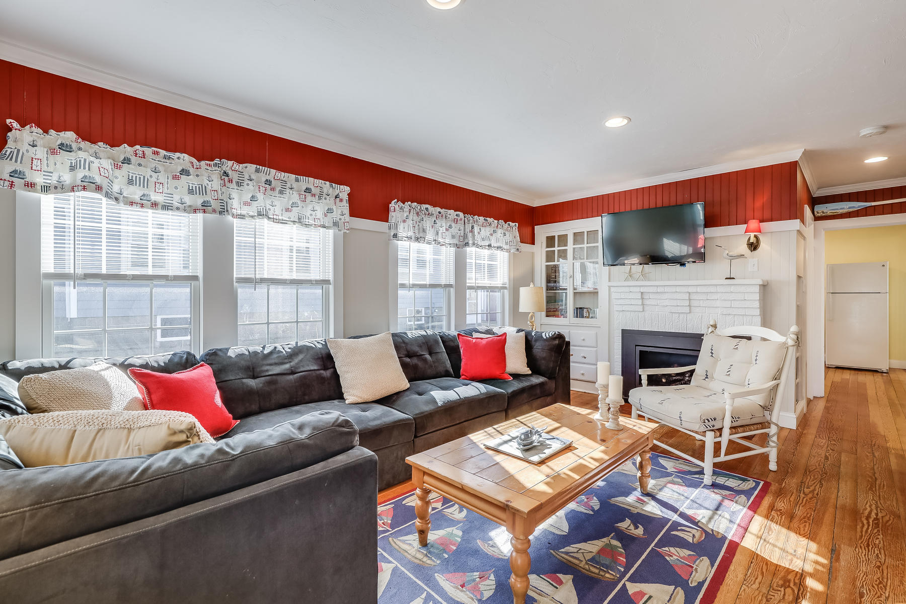 21 Carr Road Dennis Port, MA 02639 - Photo 6 of 33 a living room with furniture and a fireplace