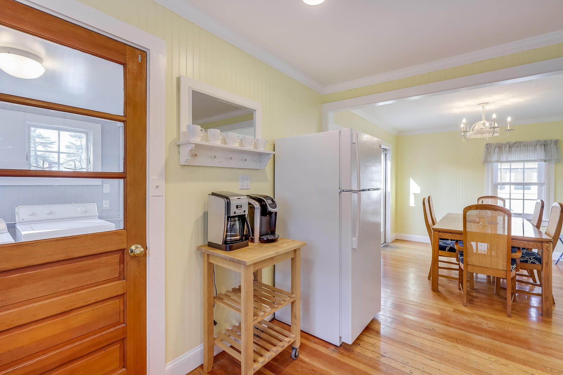 21 Carr Road Dennis Port, MA 02639 - Photo 10 of 33 a kitchen with stainless steel appliances granite countertop a refrigerator and a dining table