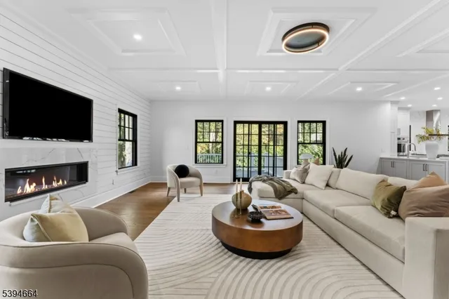 a workspace with wooden floor and a window