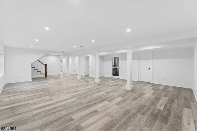 a view of a livingroom with workspace and a couch
