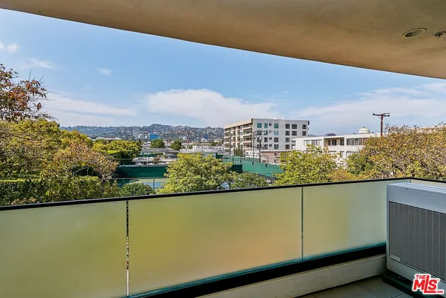 a view of a city skyline from a terrace