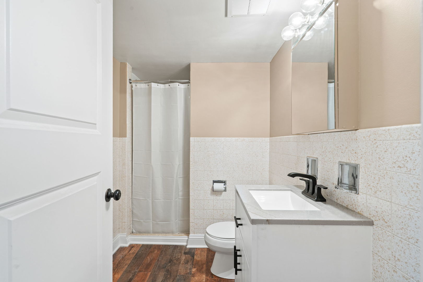 2737 Spruce Street River Grove, IL 60171 - Photo 15 of 20 a bathroom with a sink a toilet and shower