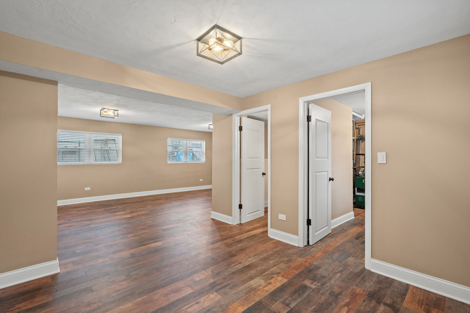 2737 Spruce Street River Grove, IL 60171 - Photo 18 of 20 a view of an empty room with wooden floor and a window