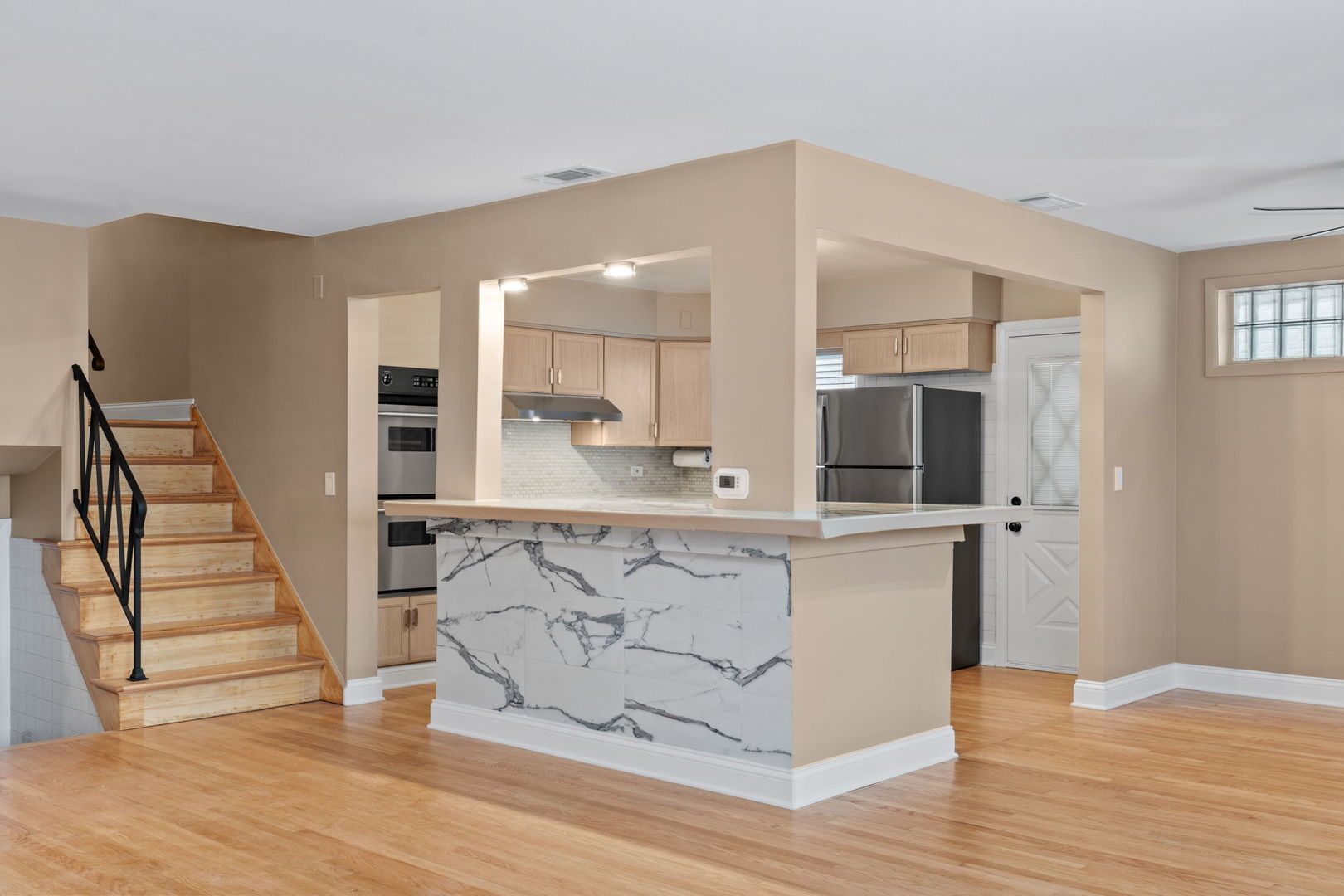 2737 Spruce Street River Grove, IL 60171 - Photo 4 of 20 a view of kitchen with cabinets and wooden floor