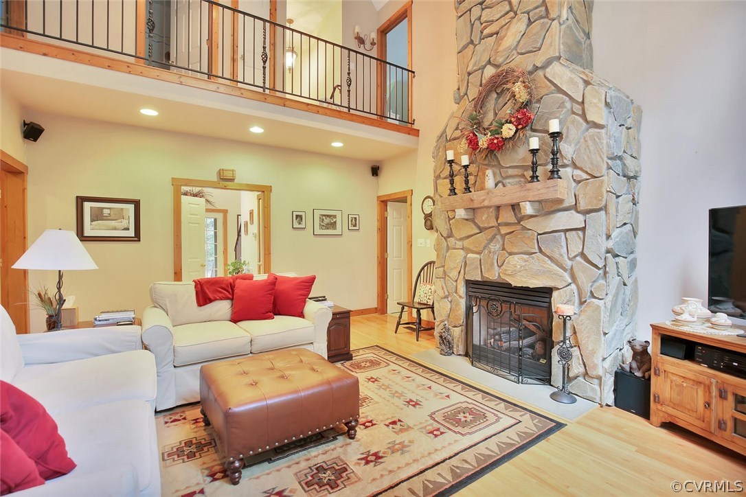 4600 Cosby Road Powhatan, VA 23139 - Photo 7 of 24 Living room with STUNNING 2 story stone wood burni