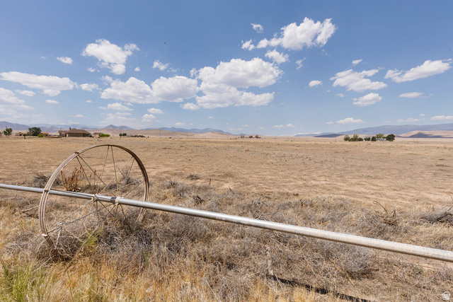 2252 South Brooklyn Road Monroe, UT 84754 - Photo 4 of 6 Expansive arid landscape featuring a clear sky with scattered clouds and distant mountain ranges