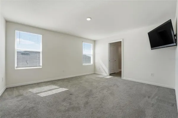 a view of a livingroom with a flat screen tv