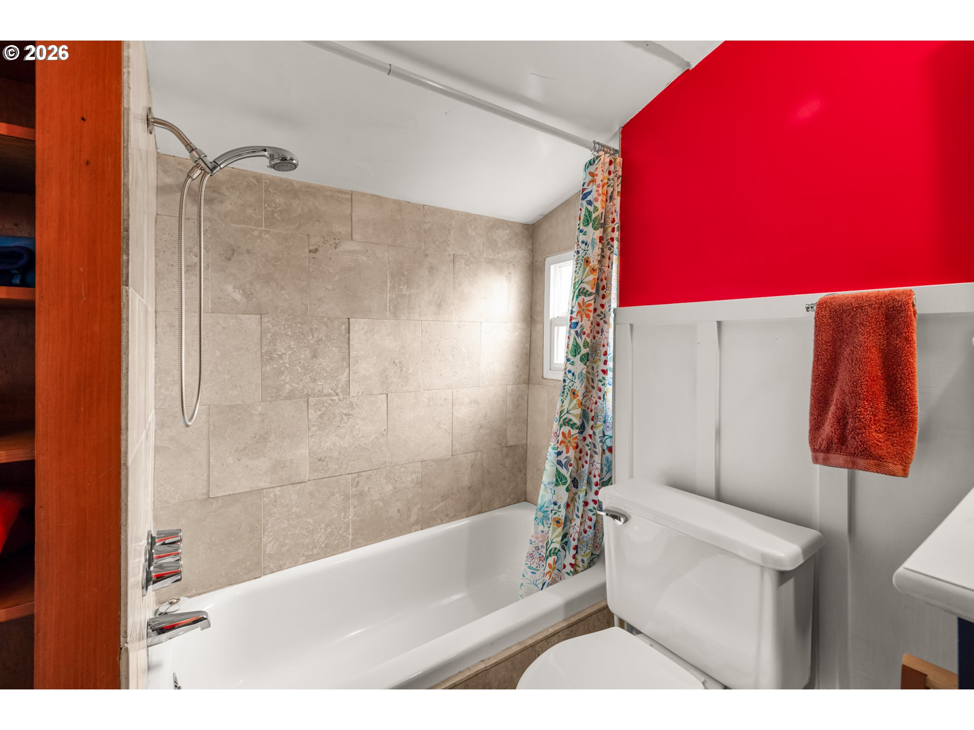 2026 Southeast Insley Street Portland, OR 97202 - Photo 17 of 32 a bathroom with a bathtub and shower