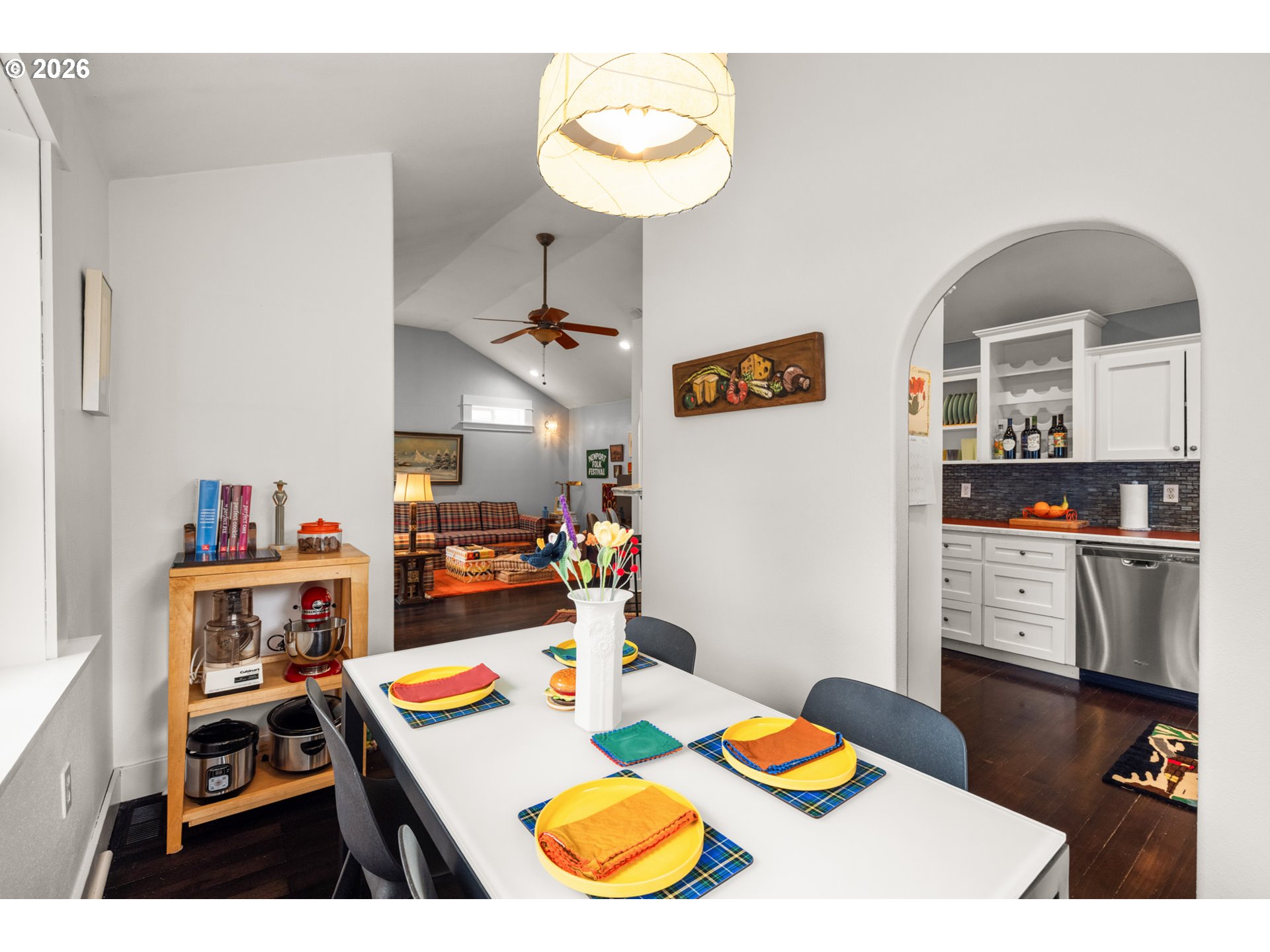 2026 Southeast Insley Street Portland, OR 97202 - Photo 9 of 32 a view of a dining room with furniture and wooden floor