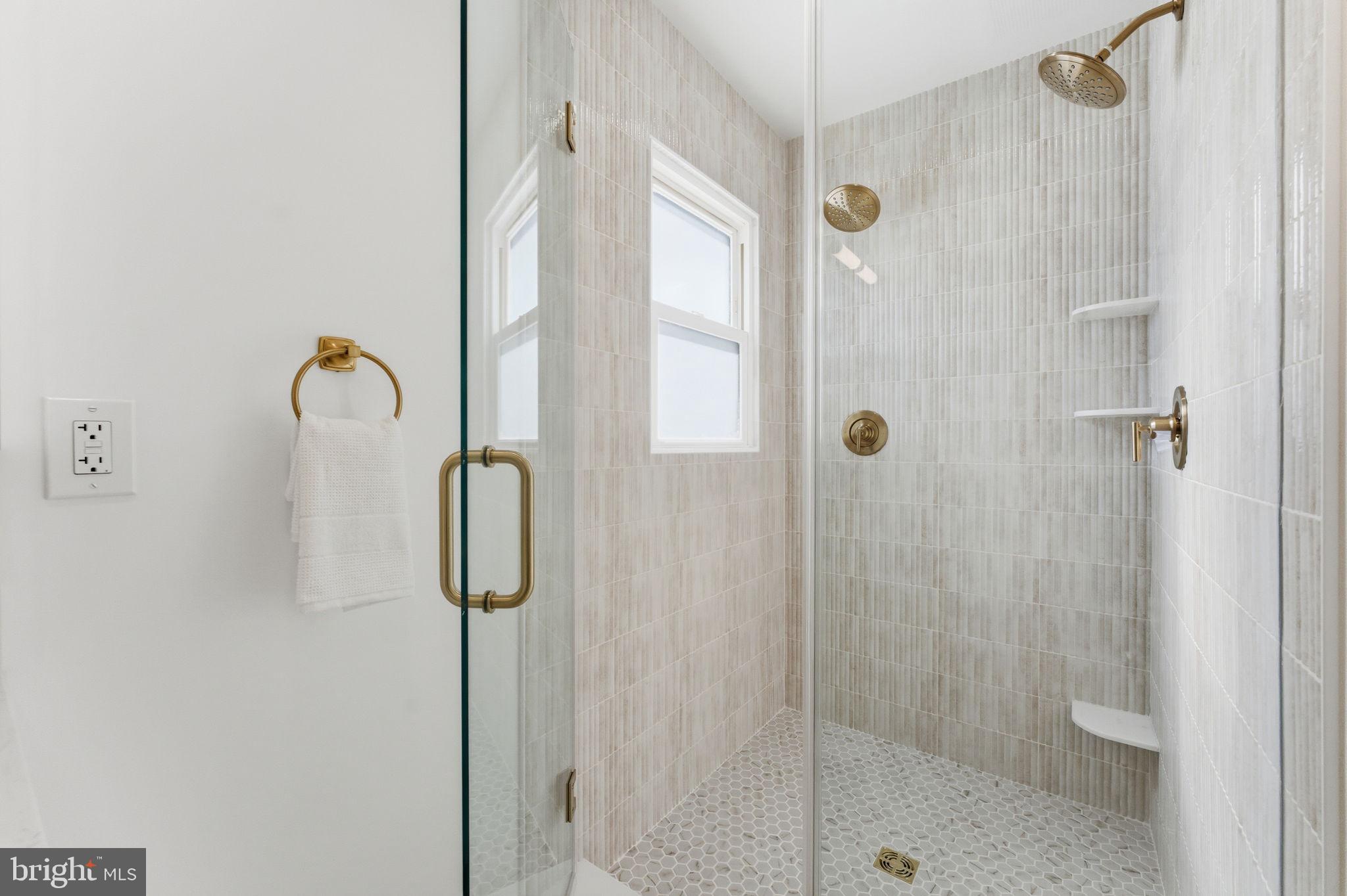 8615 Kerry Lane Springfield, VA 22152 - Photo 16 of 50 a bathroom with a shower