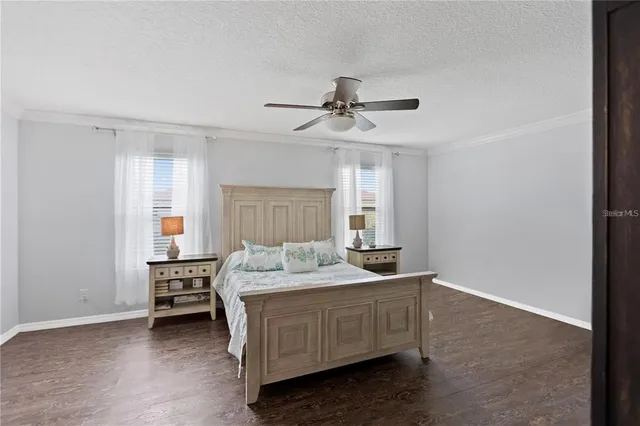 a bed room with a bed and a window