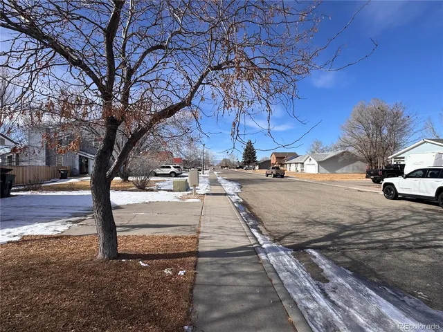 a view of street with houses