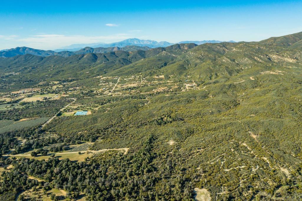 0 Chihuahua Valley Road Warner Springs, CA 92086 - Photo 7 of 7 a view of a mountain range with lush green forest