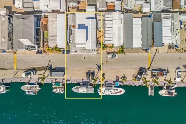a view of a swimming pool with a table and chairs