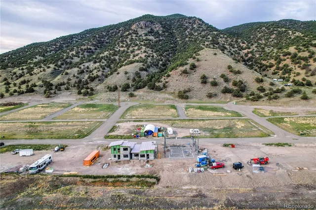 a view of an ocean and a mountain