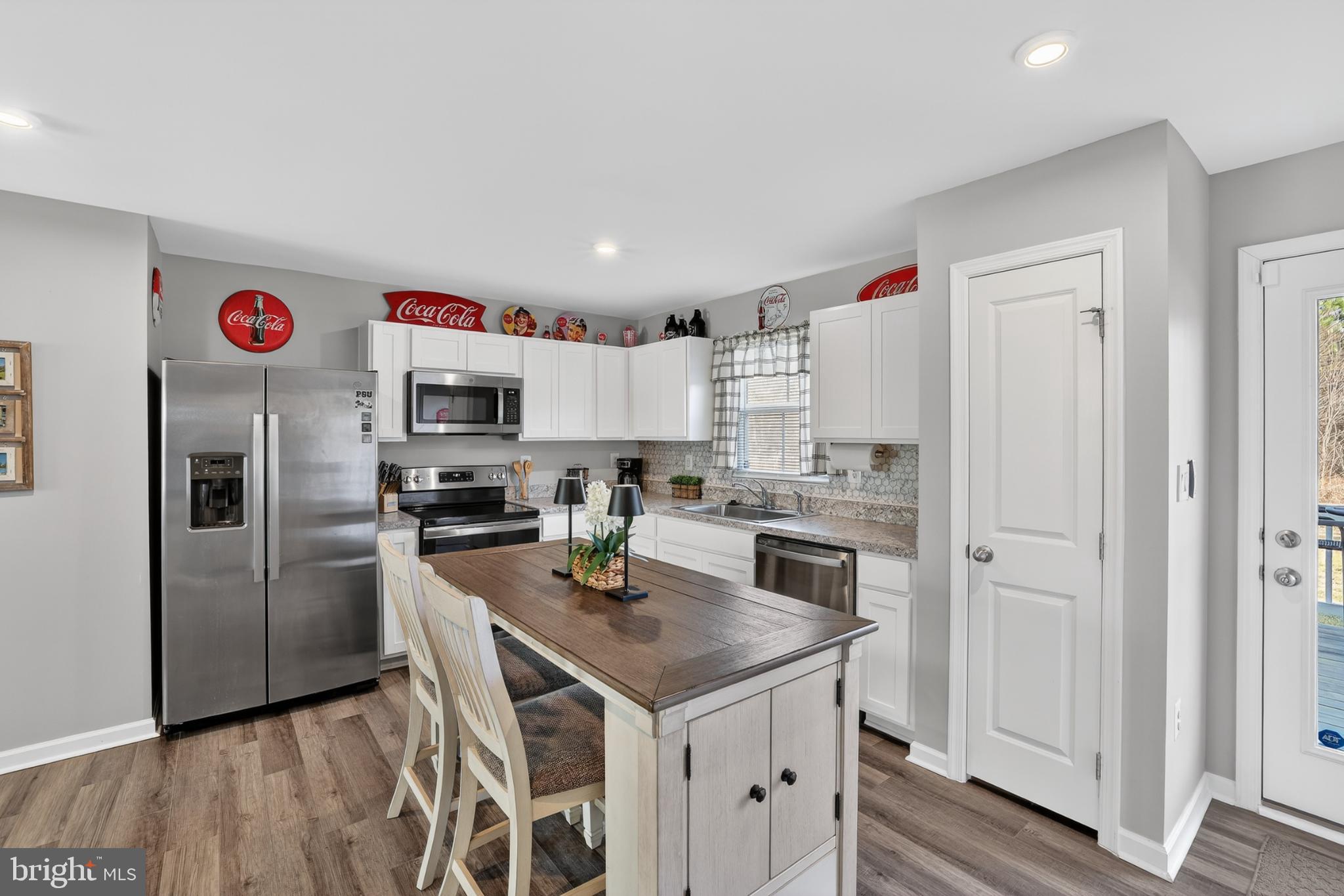 7069 Wise Lane King George, VA 22485 - Photo 12 of 39 Modern kitchen with sleek finishes and charm.