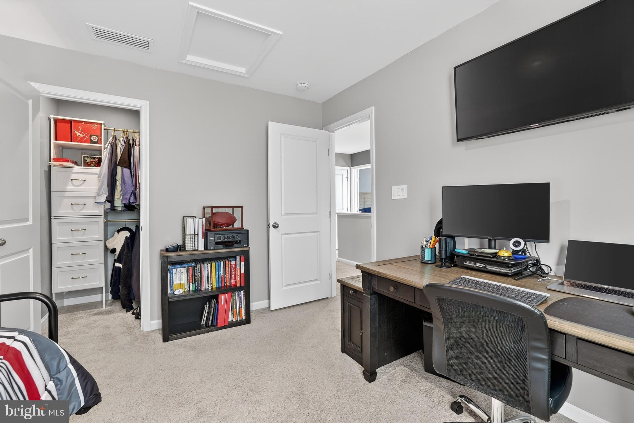 7069 Wise Lane King George, VA 22485 - Photo 19 of 39 Modern workspace in a cozy bedroom retreat.