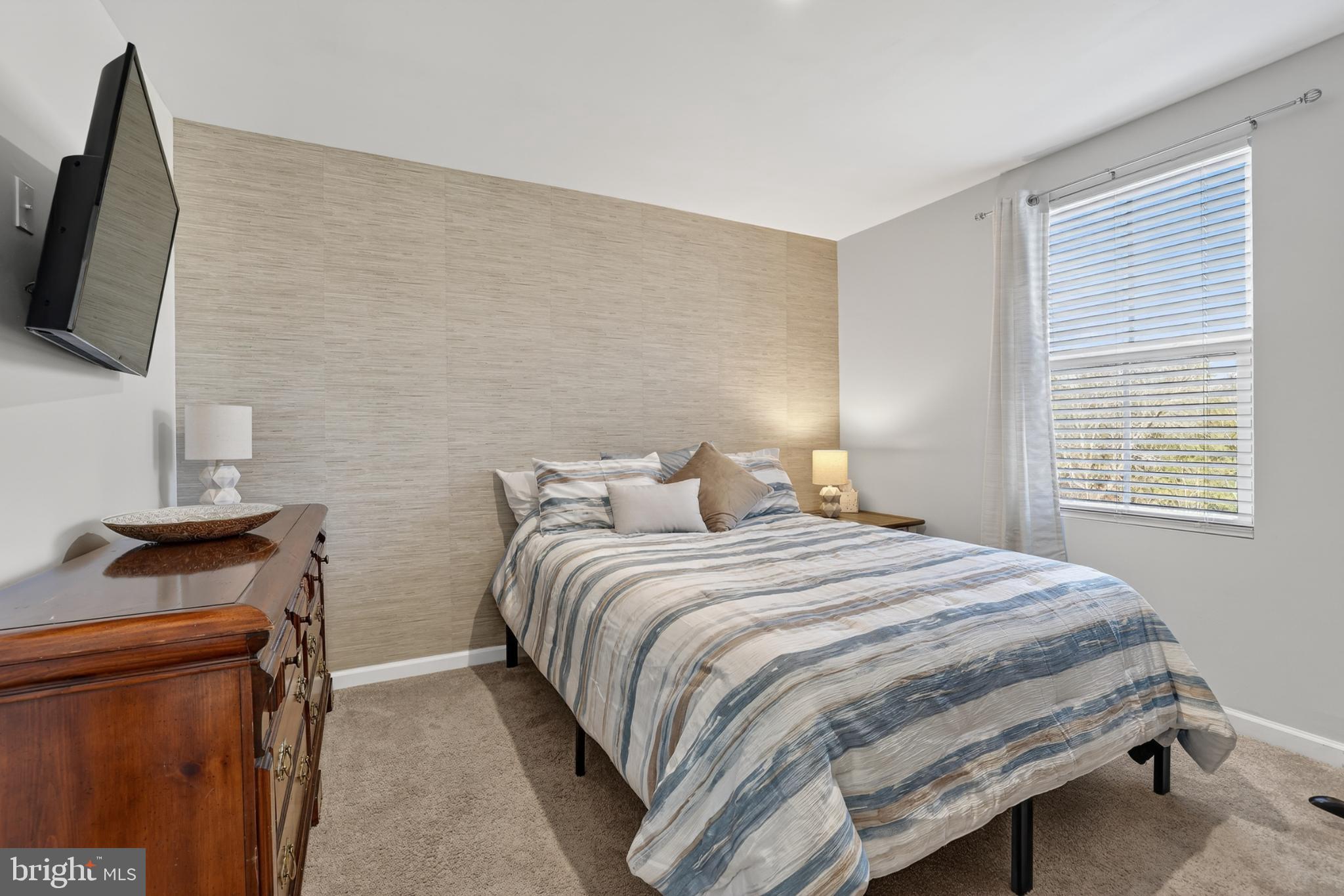 7069 Wise Lane King George, VA 22485 - Photo 22 of 39 Cozy bedroom with natural light and warmth.